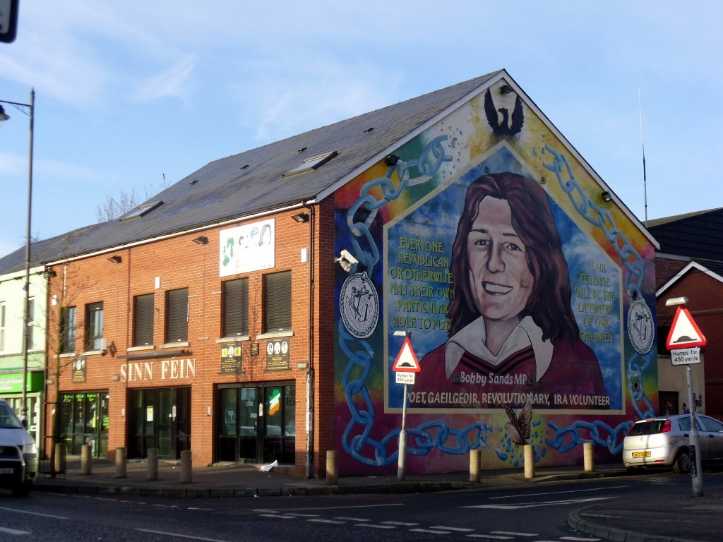Wall mural of Bobby Sands MP on the side of a Sinn Fein Office