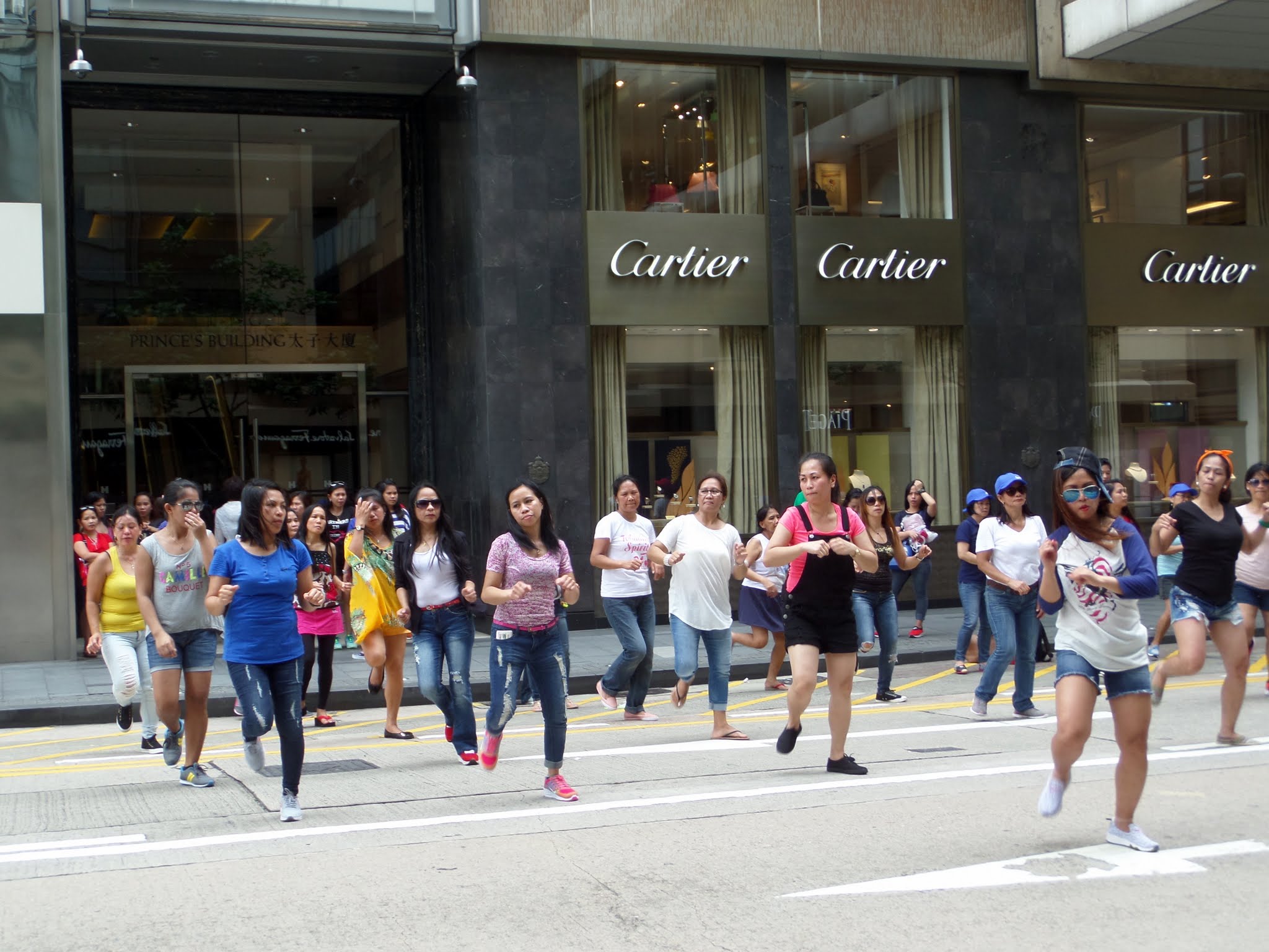 Maids dancing on day off in Hong Kong