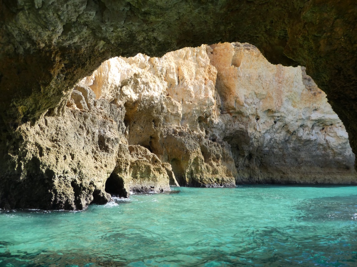 Entering the sandstone caves, Lagos, Algarve